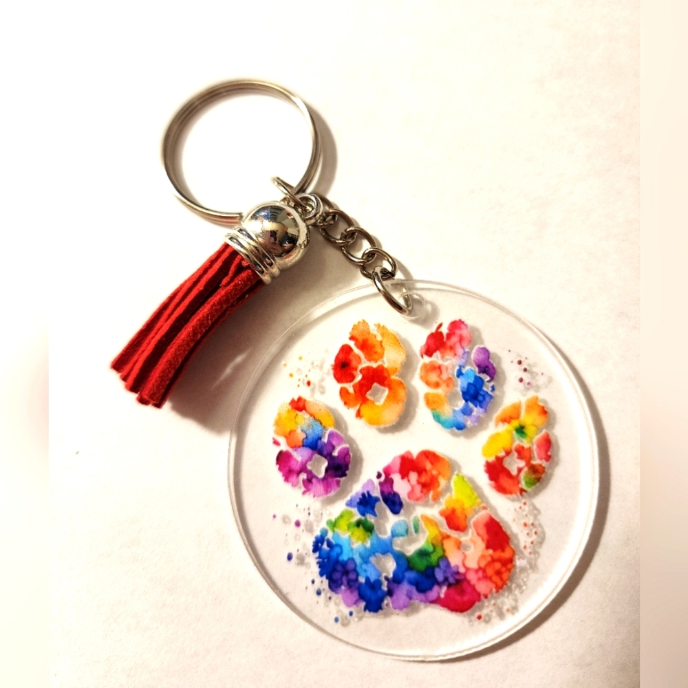 Colorful Paw Print Keychain with Red Tassel